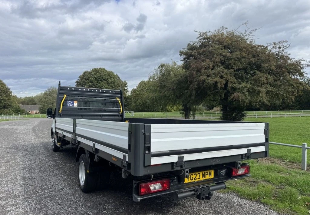 2023 Ford Transit Dropside Van — rear three-quarter view