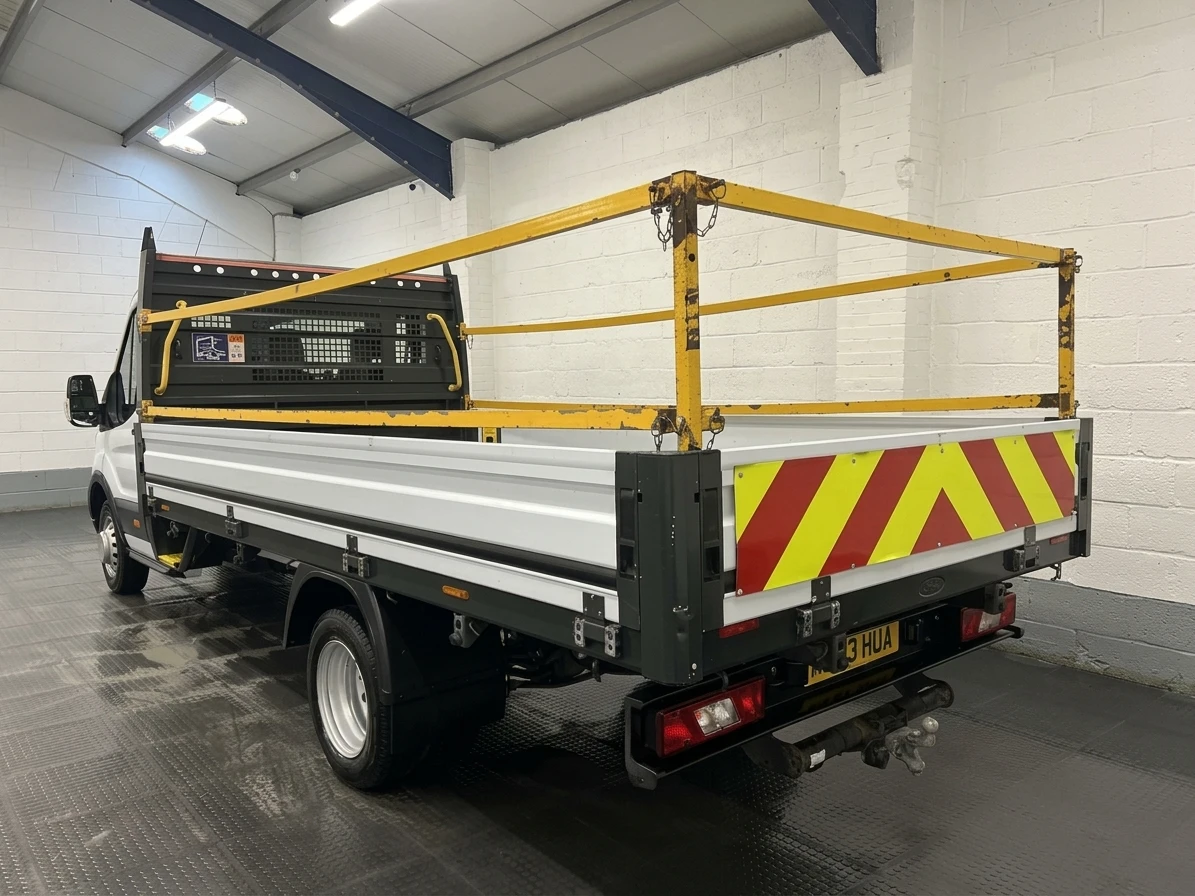 2023 Ford Transit Dropside Van — rear three-quarter view