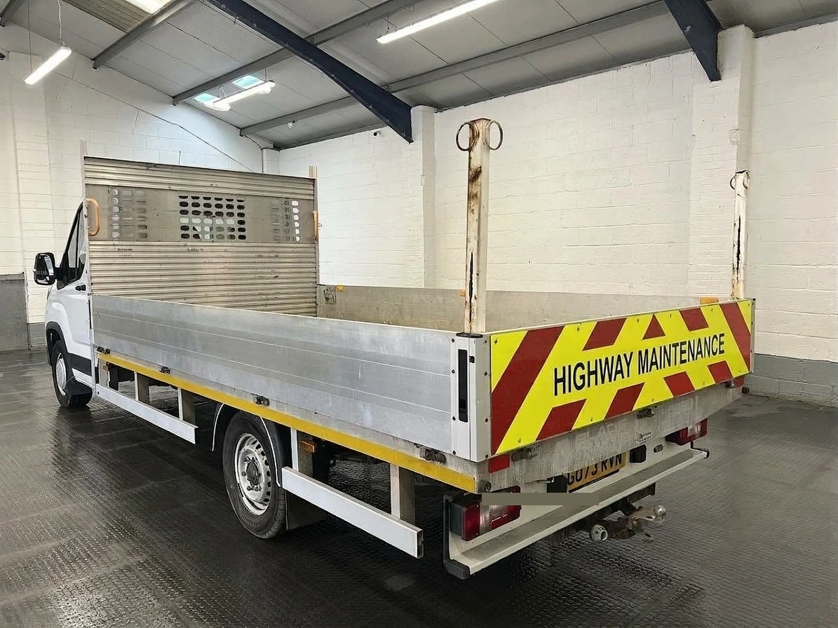 2023 Maxus Deliver 9 Dropside Van — rear three-quarter view