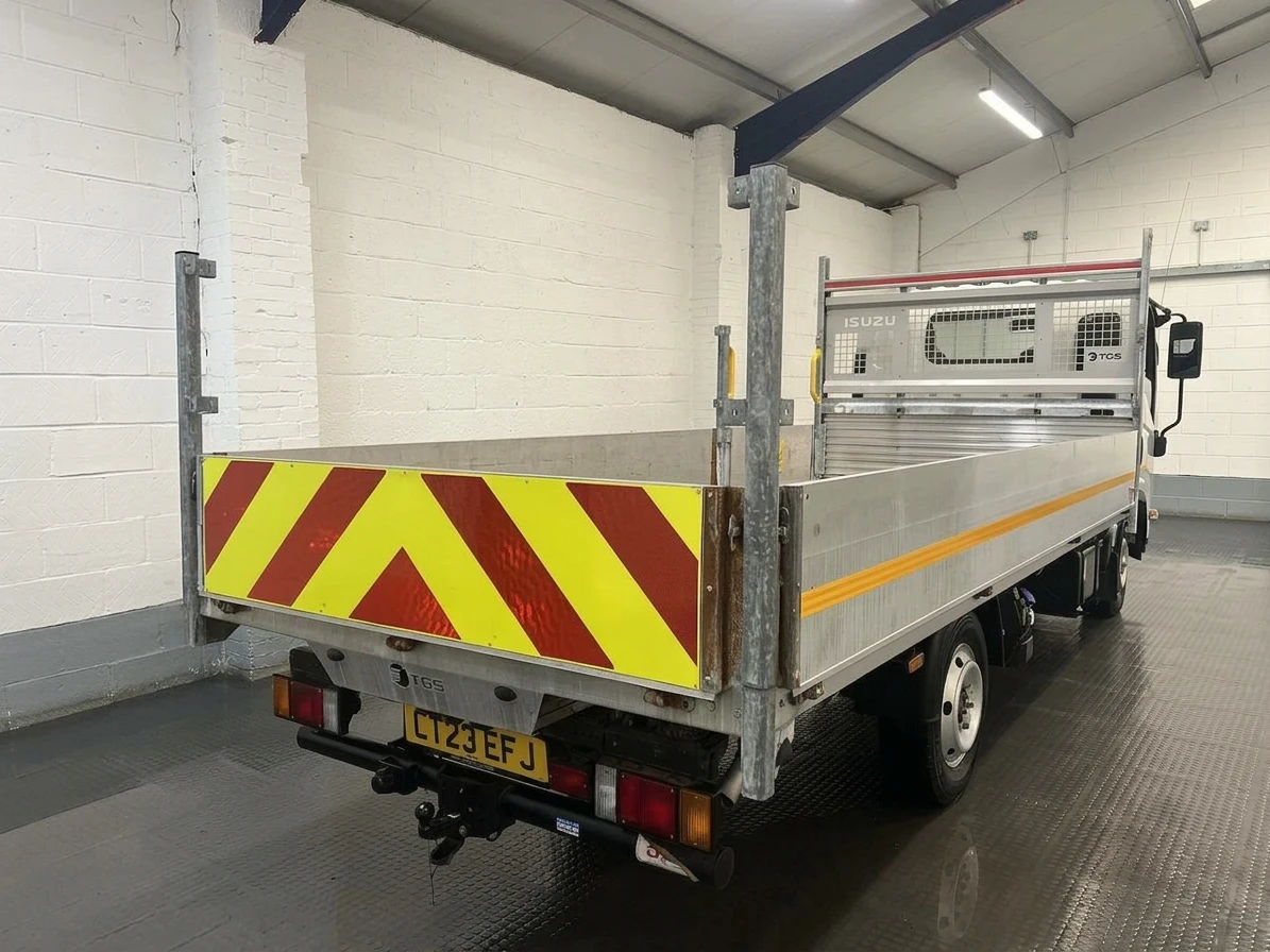 2023 Isuzu Grafter Dropside Van — rear three-quarter view