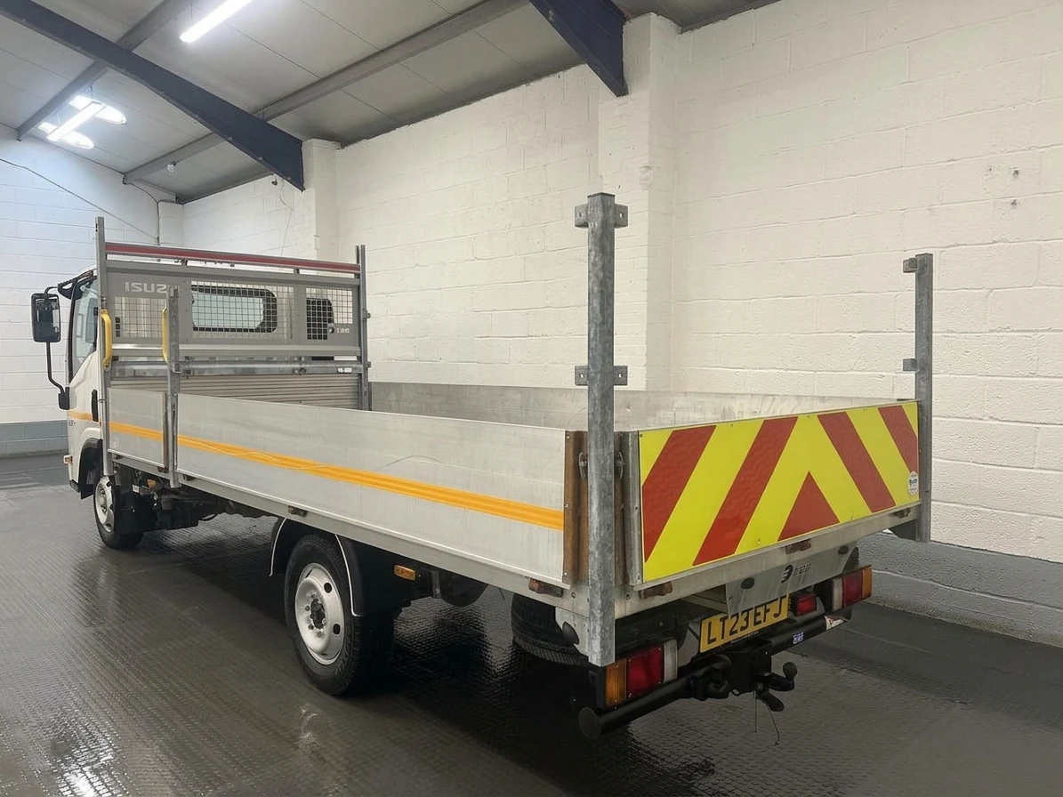 2023 Isuzu Grafter Dropside Van — rear three-quarter view