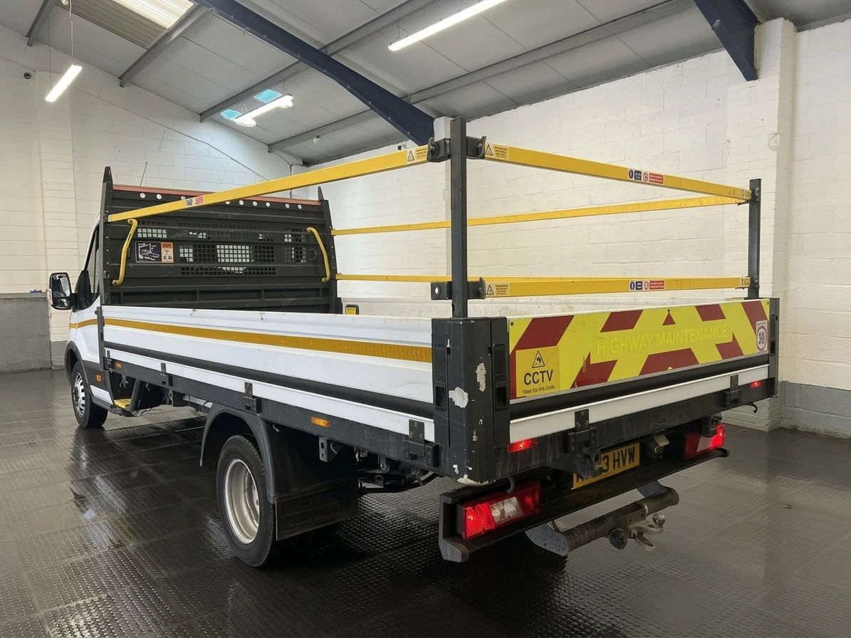 2023 Ford Transit Dropside Van — rear three-quarter view