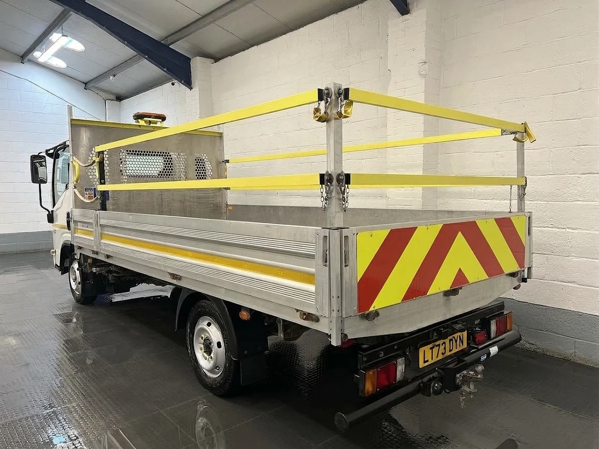 2023 Isuzu Grafter Dropside Van — rear three-quarter view