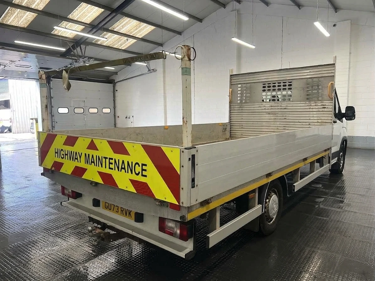 2023 Maxus Deliver 9 Dropside Van — rear three-quarter view