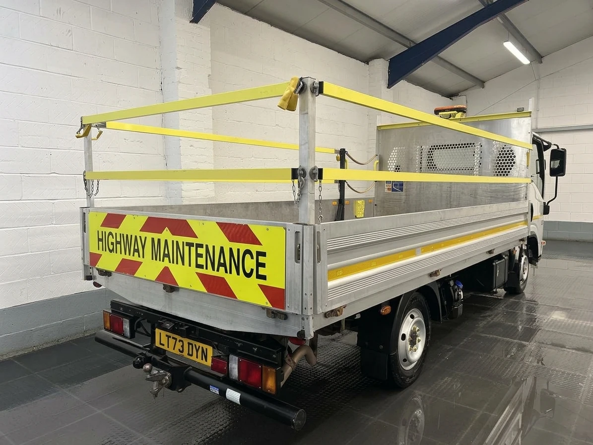 2023 Isuzu Grafter Dropside Van — rear three-quarter view