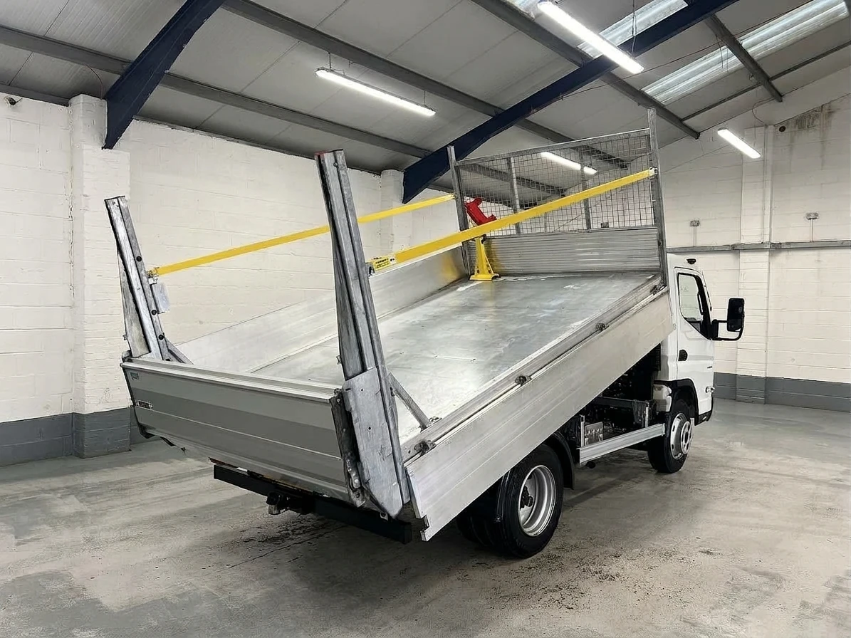 2023 Fuso Canter Tipper Van — rear three-quarter view