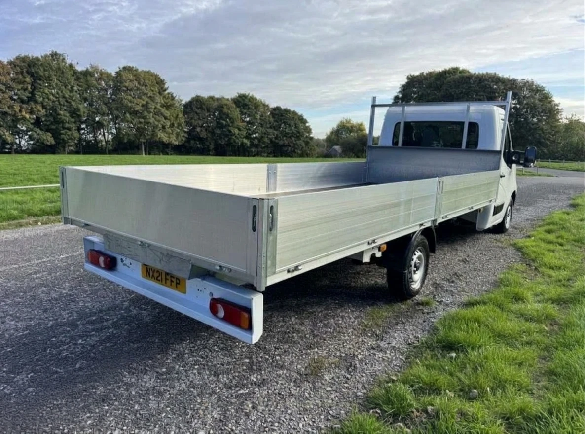 2021 Nissan NV400 Dropside Van — rear three-quarter view