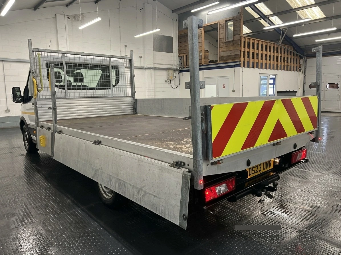 2023 Ford Transit Dropside Van — rear three-quarter view