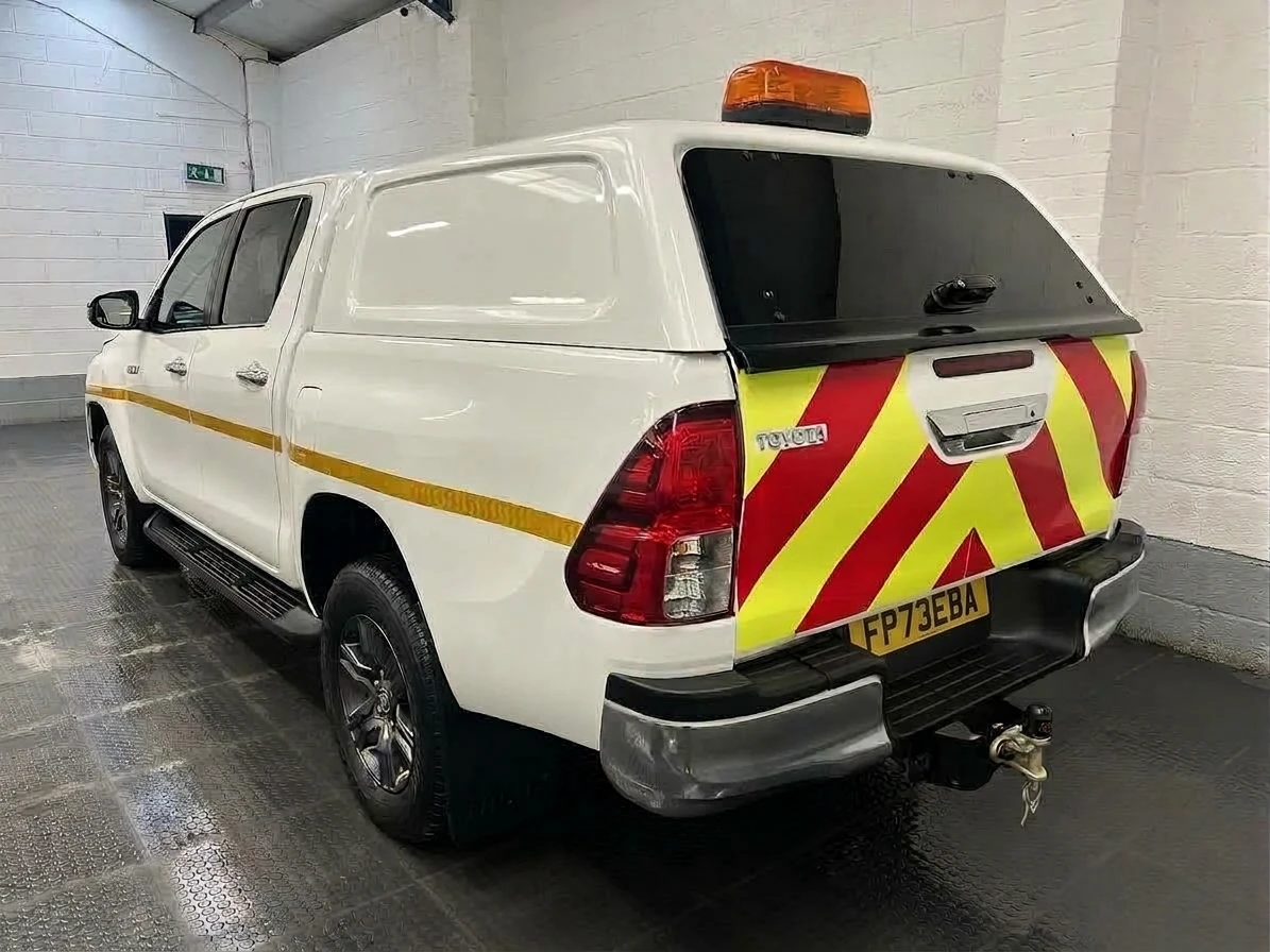 2023 Toyota Hilux Double Cab PickUp Van — rear three-quarter view