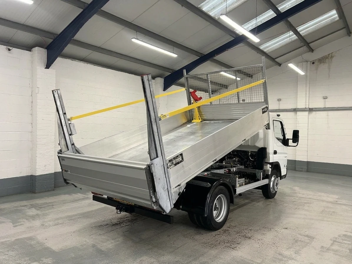 2023 Fuso Canter Tipper Van — rear three-quarter view