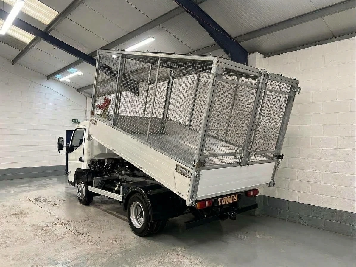 2023 Fuso Canter Tipper Van — rear three-quarter view