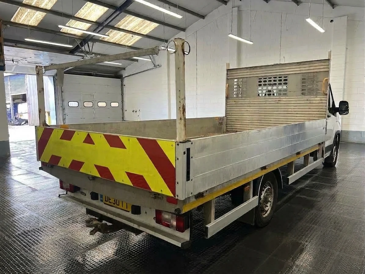 2023 Maxus Deliver 9 Dropside Van — rear three-quarter view