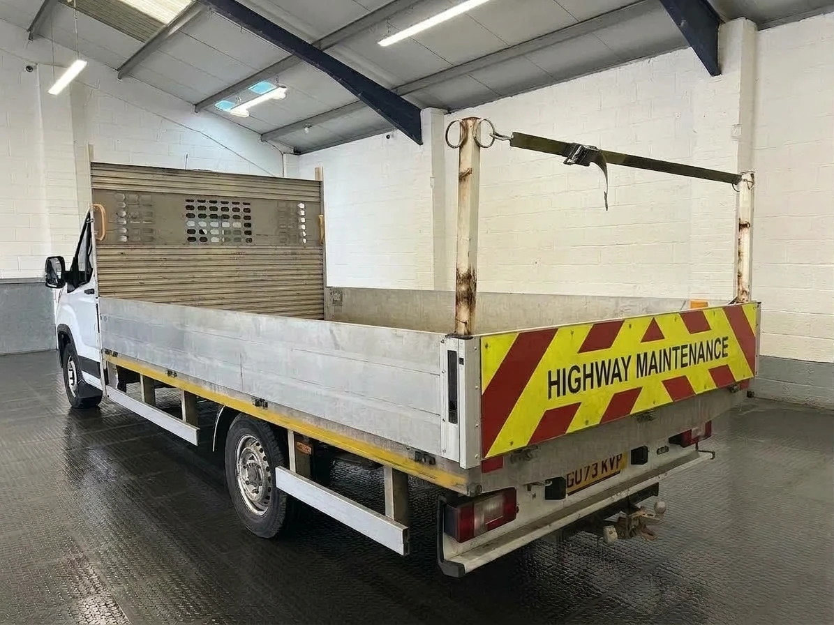 2023 Maxus Deliver 9 Dropside Van — rear three-quarter view