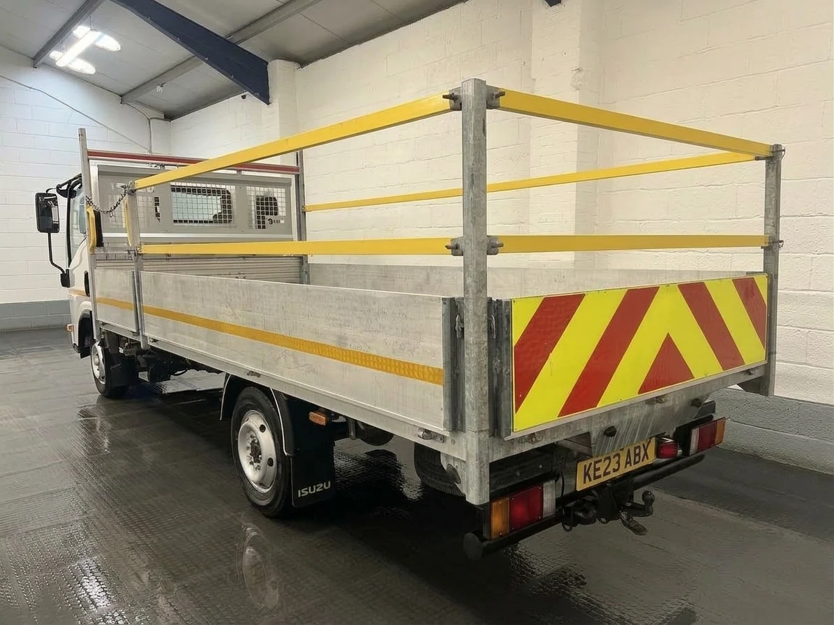 2023 Isuzu Grafter Dropside Van — rear three-quarter view