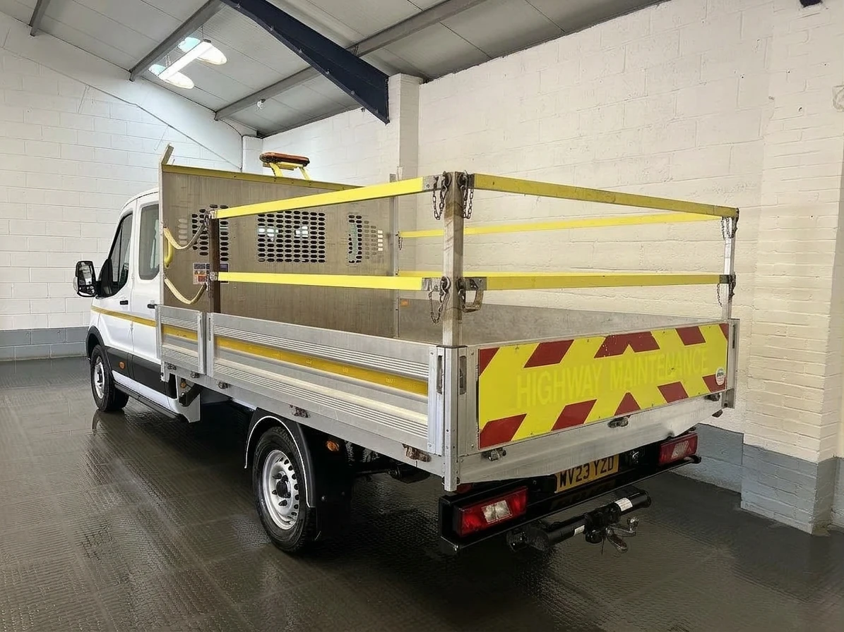 2023 Ford Transit Double Cab Dropside Van — rear three-quarter view