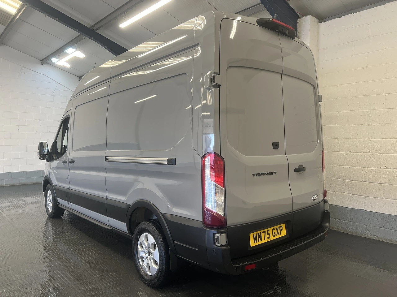 2025 Ford Transit High Roof Panel Van — rear three-quarter view