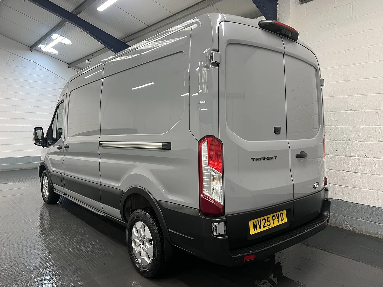 2025 Ford Transit Panel Van — rear three-quarter view
