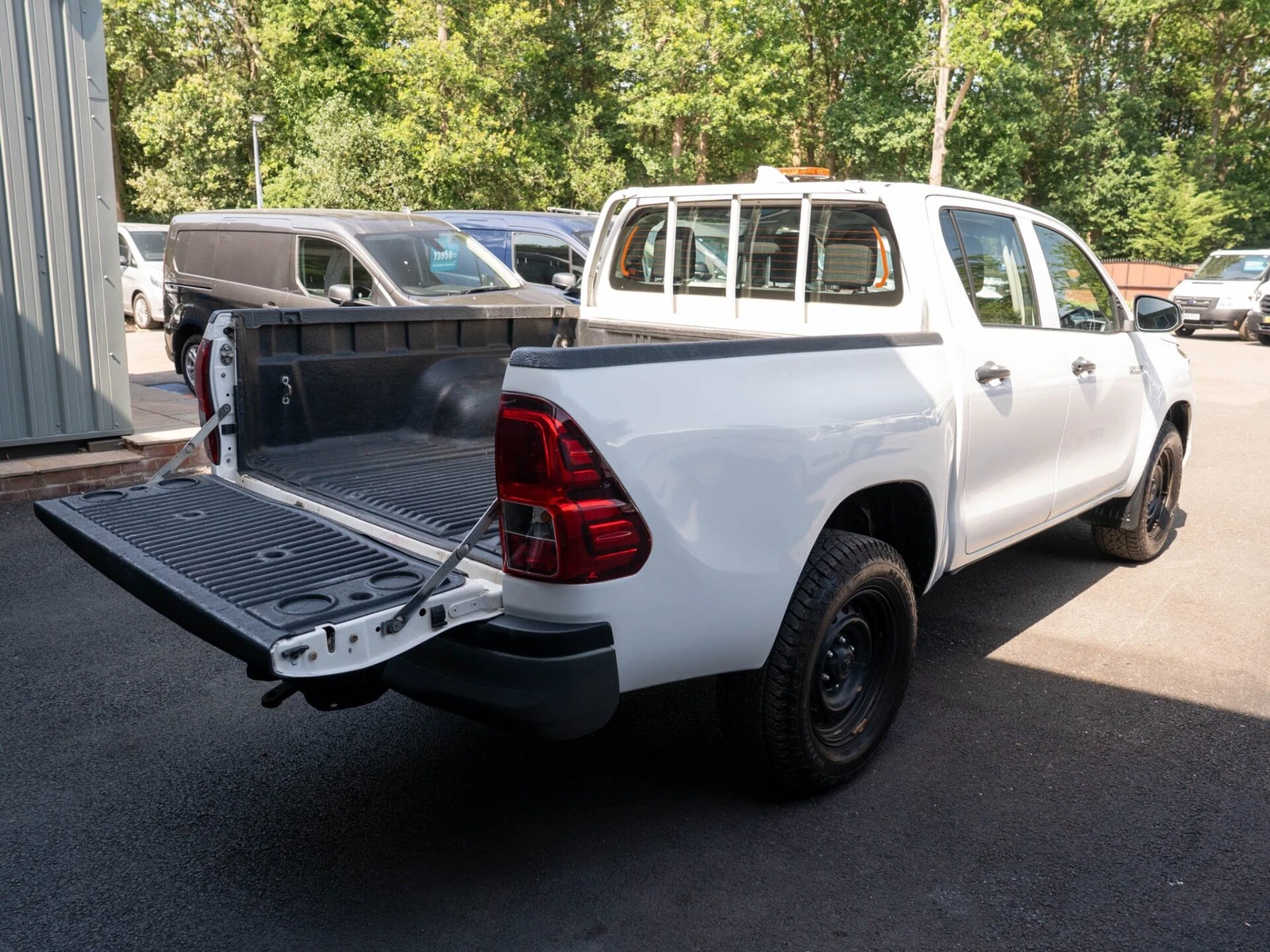 2022 Toyota Hilux Double Cab PickUp Van — rear three-quarter view