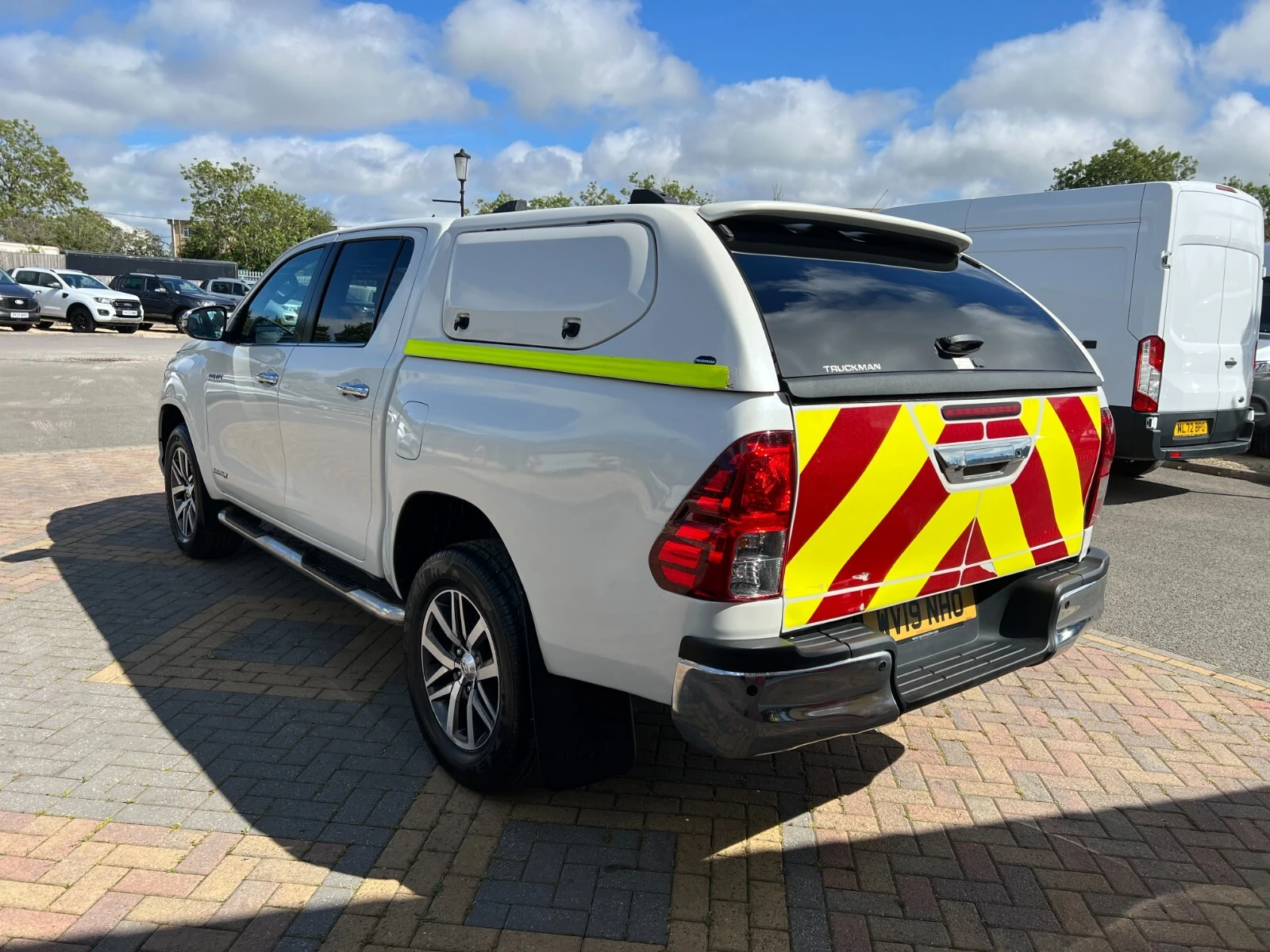 2019 Toyota Hilux Double Cab PickUp Van — rear three-quarter view