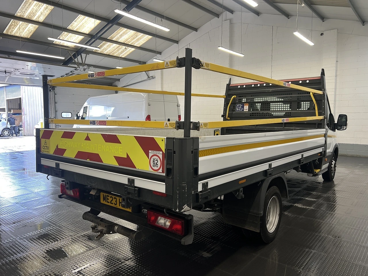 2023 Ford Transit Dropside Van — rear three-quarter view