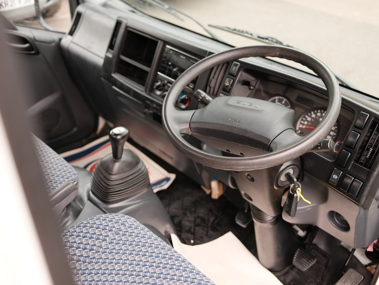 2024 Isuzu Grafter Dropside Van — cab interior