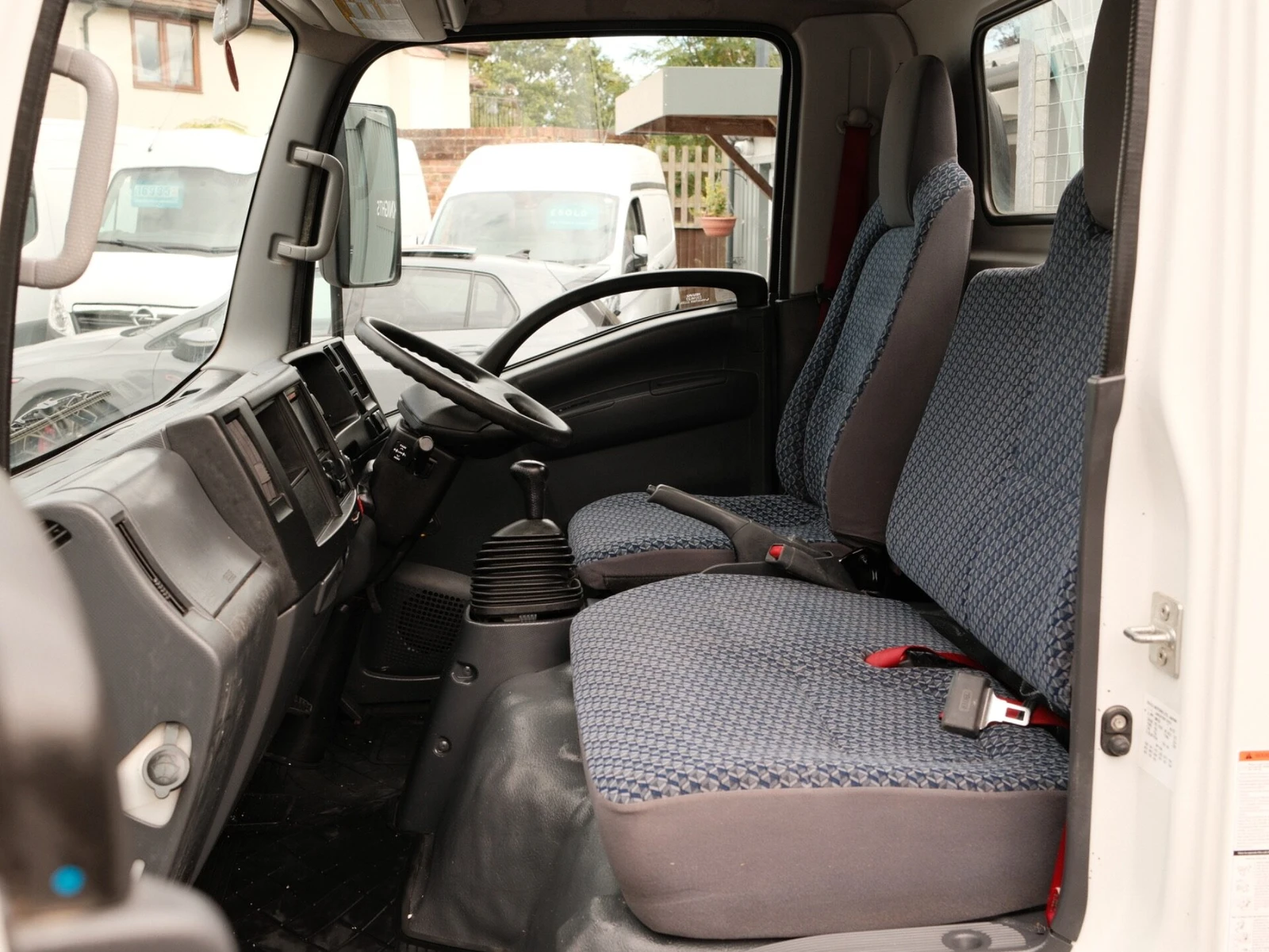 2024 Isuzu Grafter Dropside Van — cab interior