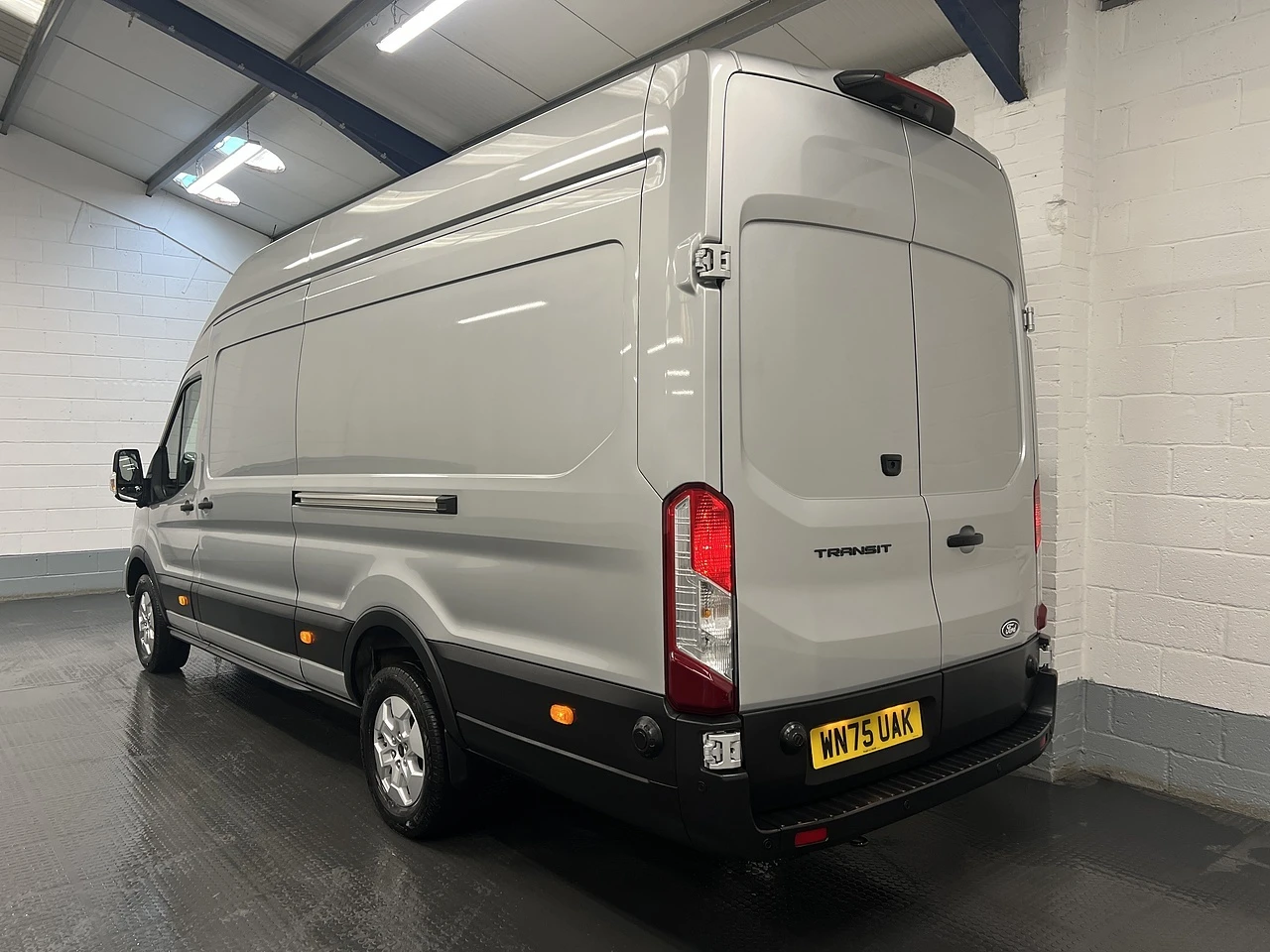 2025 Ford Transit High Roof Panel Van — rear three-quarter view