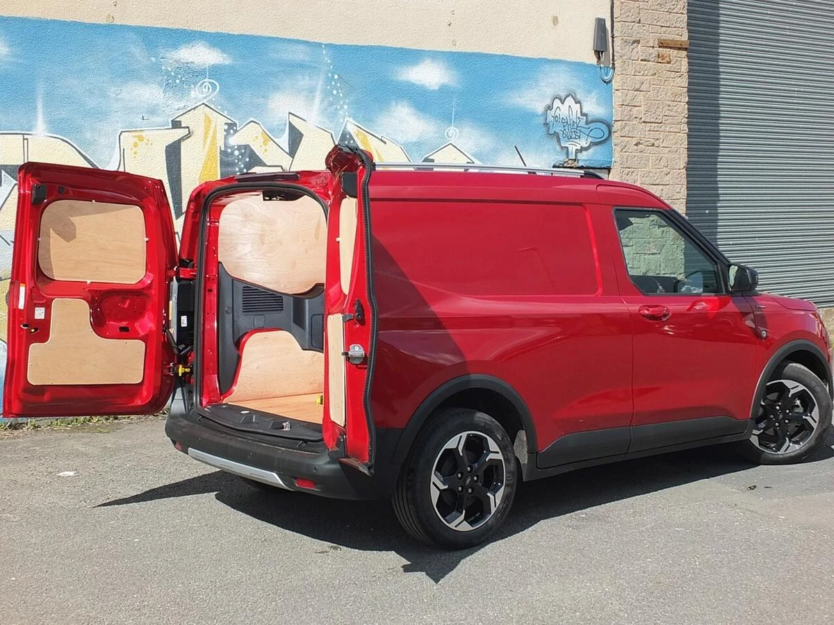 2025 Ford Transit Courier Panel Van — rear three-quarter view