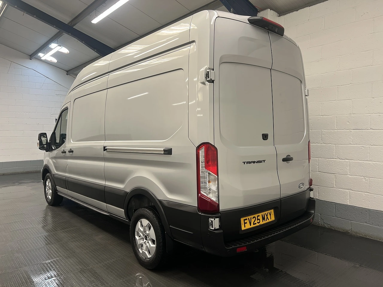 2025 Ford Transit High Roof Panel Van — rear three-quarter view