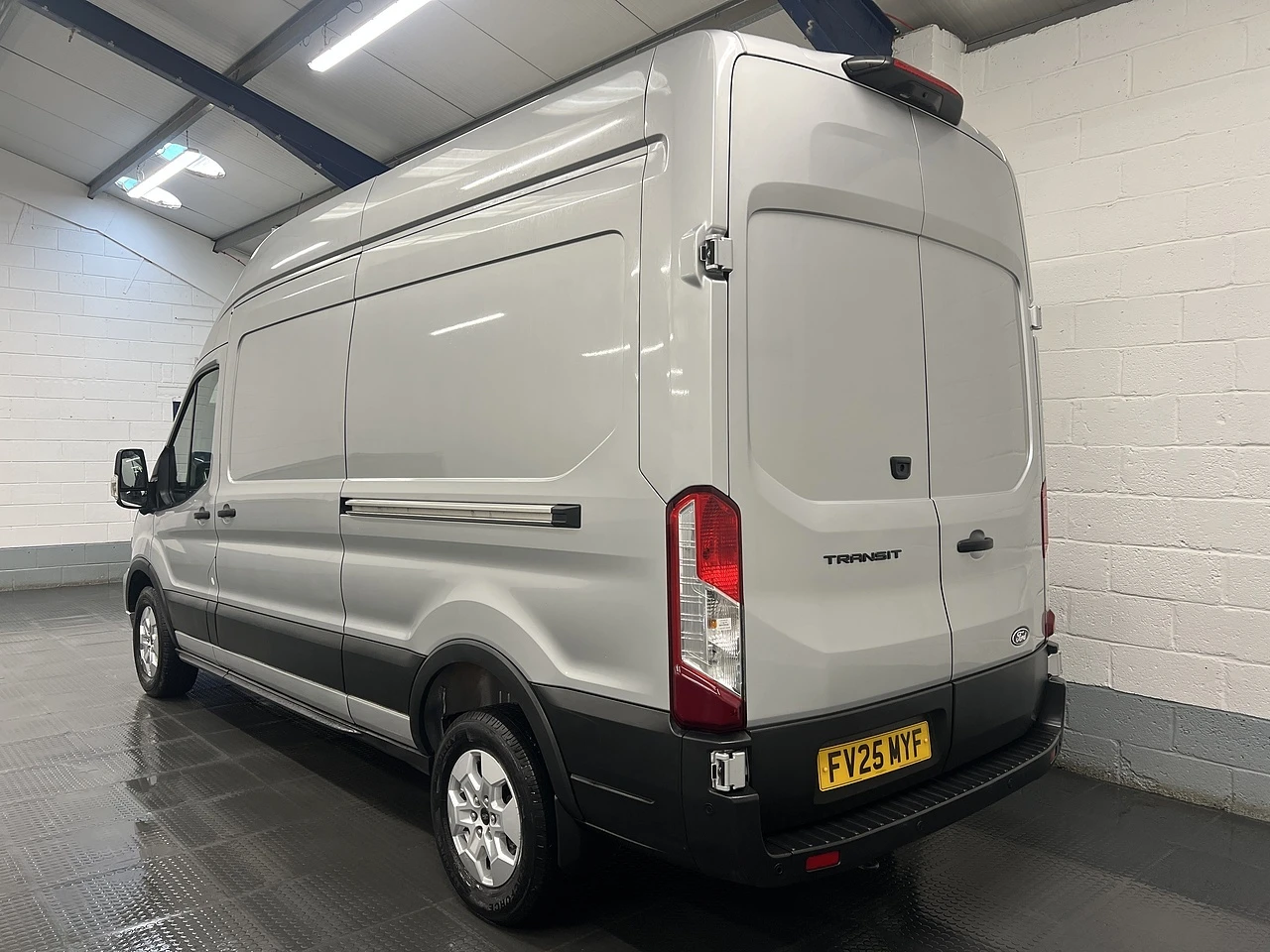 2025 Ford Transit High Roof Panel Van — rear three-quarter view